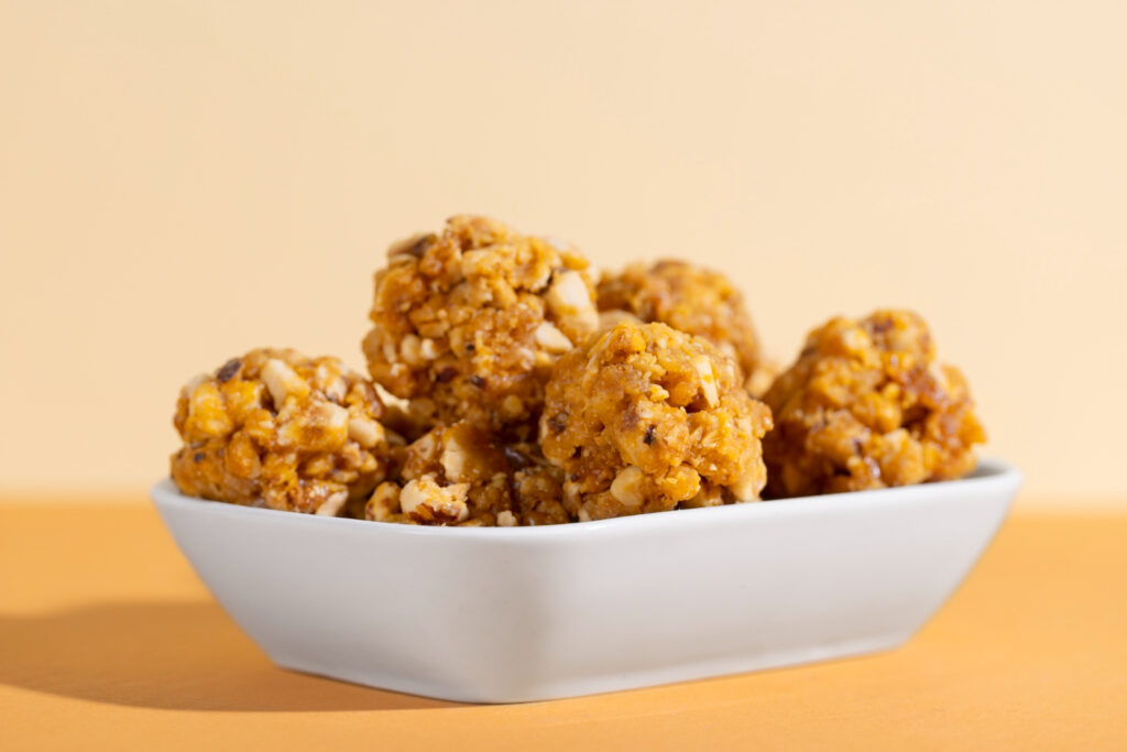 Placing Tyson popcorn chicken in air fryer basket