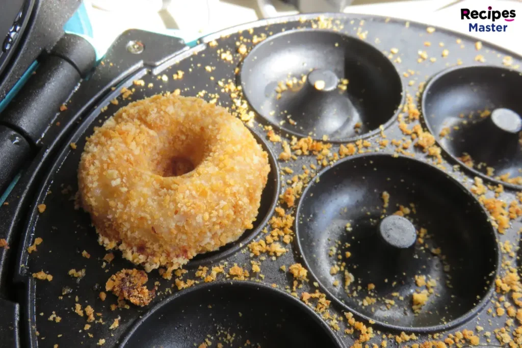 When was the first donut making machine invented?